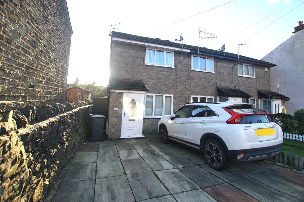 Main image of property: Surrey St, Glossop, SK13 7AH **DRIVEWAY**