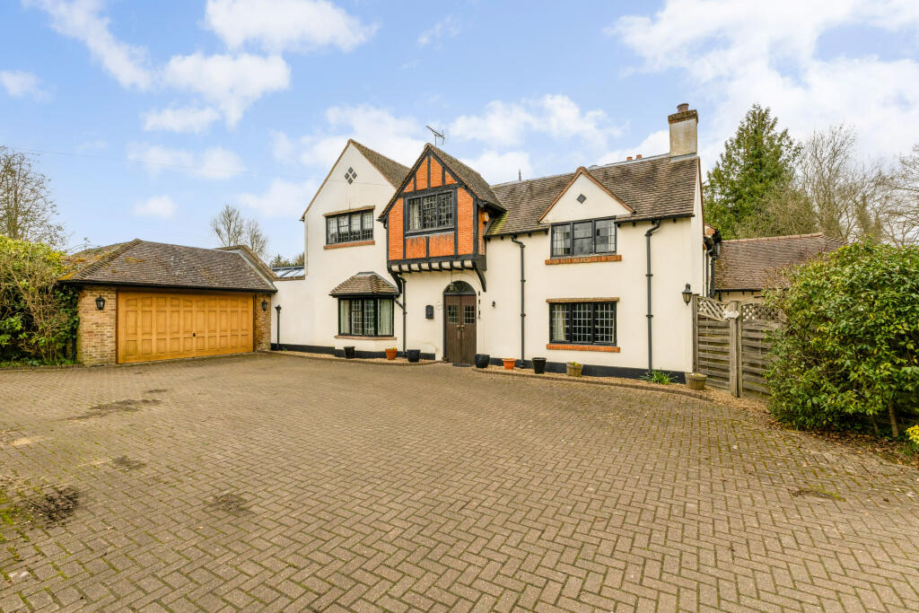 Main image of property: Kingfield Green, Woking, GU22