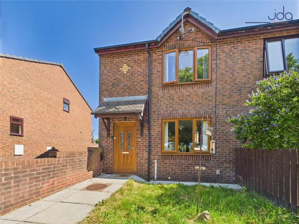 Main image of property: Torrisholme Road |  a well-presented end townhouse benefits from additional side windows