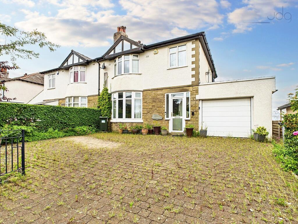 Main image of property: Marine Drive, Hest Bank | A spacious extended home!