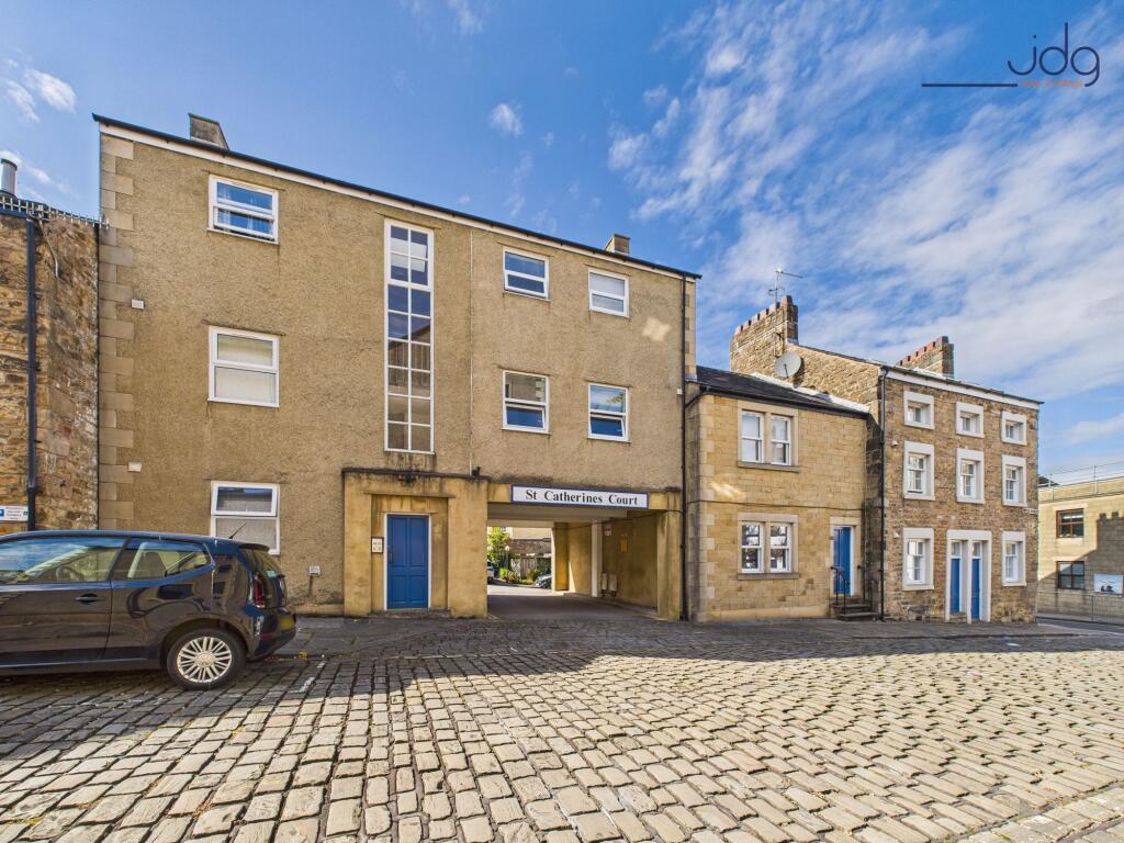 Main image of property: St Catherines Court, Lancaster City Centre - a ground floor apartment with patio.