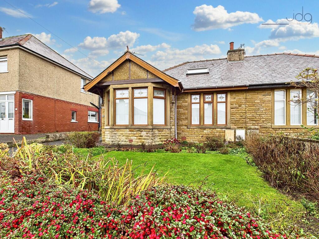 Main image of property: Twemlow Parade, Heysham | Spacious bungalow on a great plot just moments from the seafront