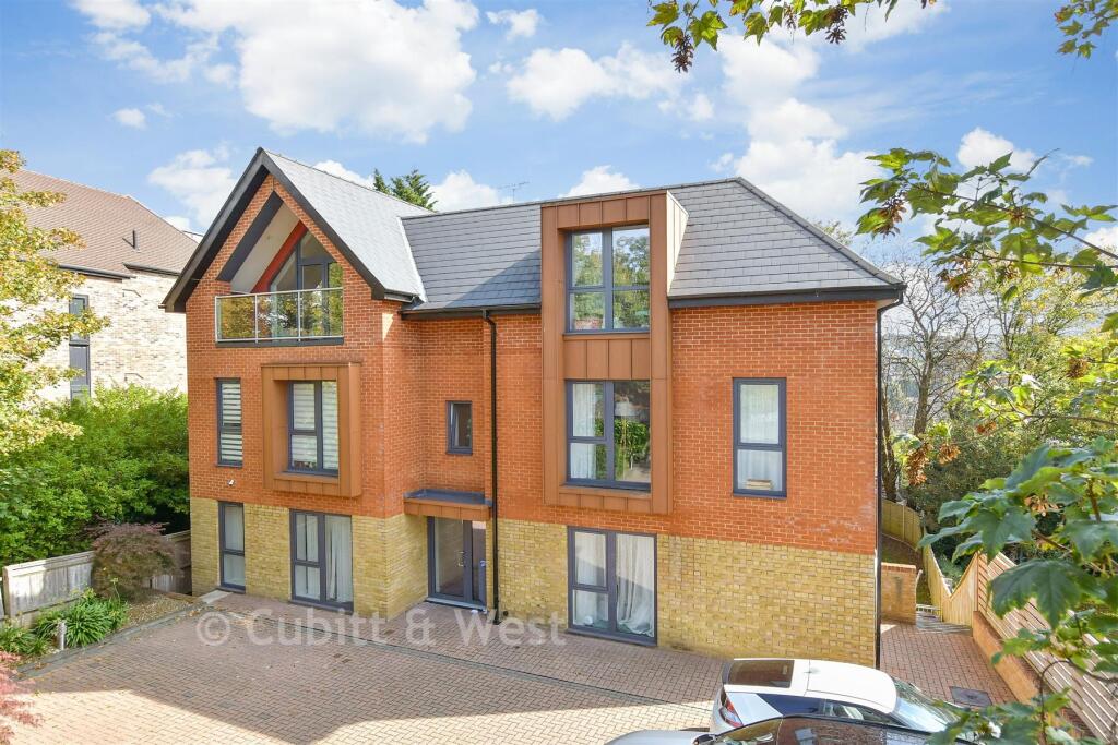 Main image of property: Woodcote Grove Road, Coulsdon, Surrey