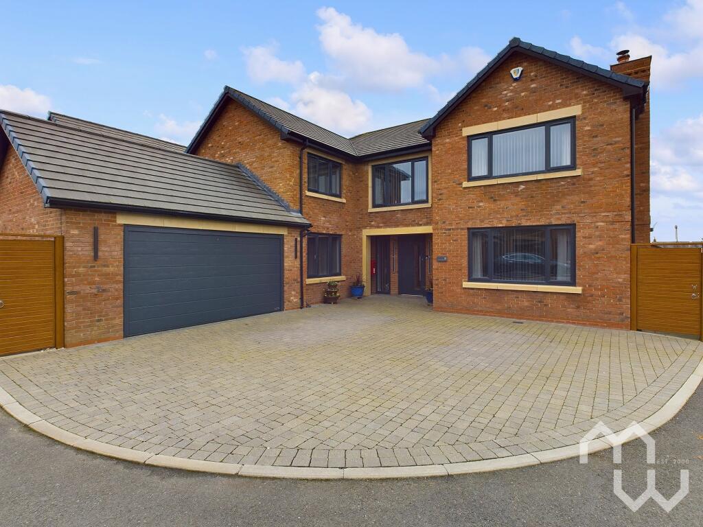 Main image of property: Moss Green Close, Hesketh Bank, PR4
