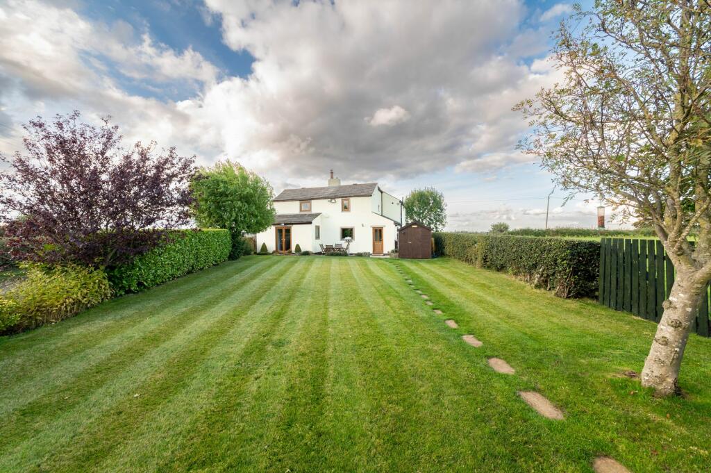 Main image of property: Ash Cottage, Woodhouse Lane, near Emley, HD8