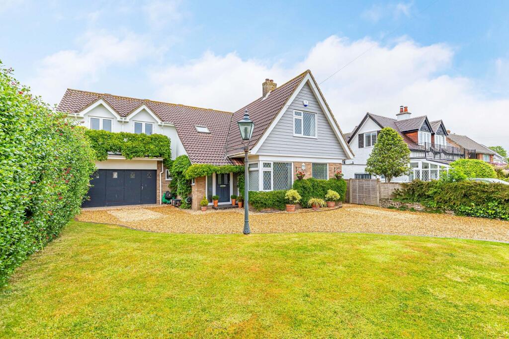 Main image of property: Barton Wood Road, Barton On Sea, New Milton, Hampshire. BH25 7NN