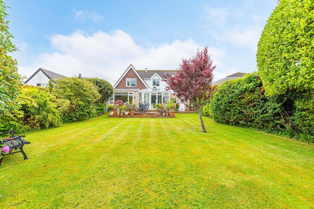 Main image of property: Barton Wood Road, Barton On Sea, New Milton, Hampshire. BH25 7NN