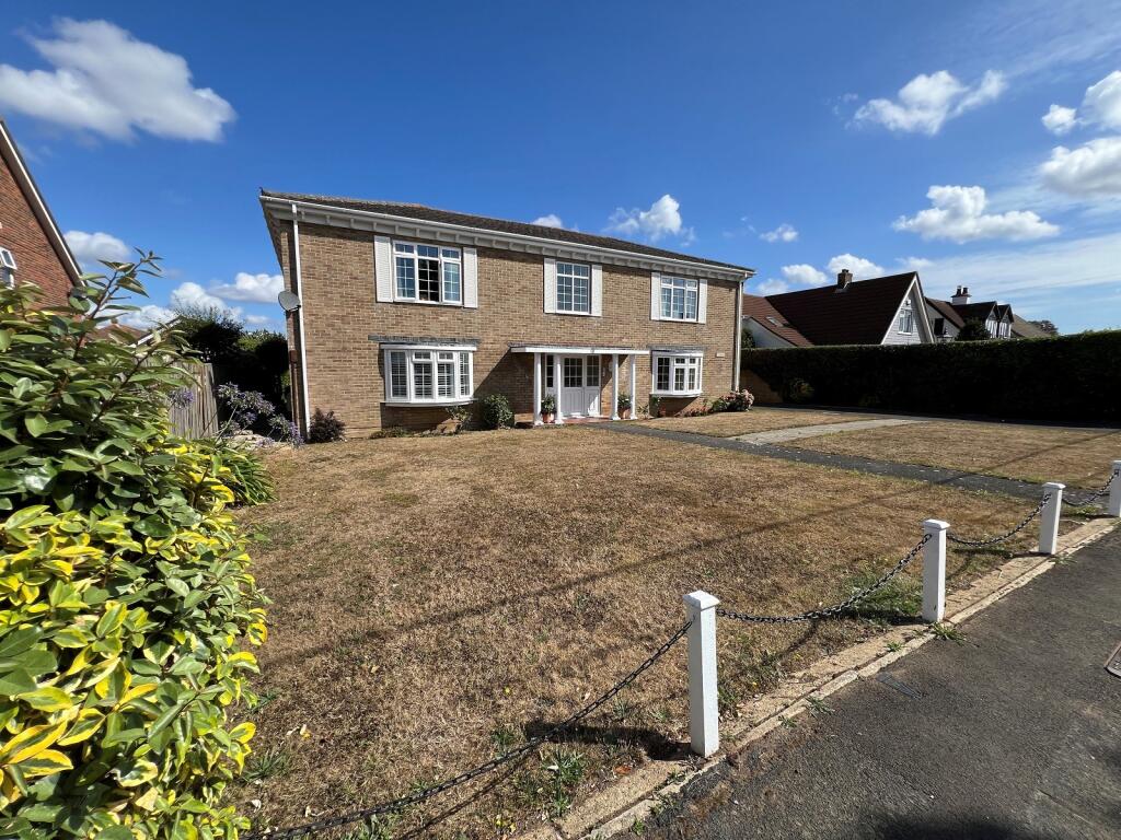 Main image of property: 10 Barton Wood Road, Barton On Sea, New Milton, Hampshire. BH25 7NN