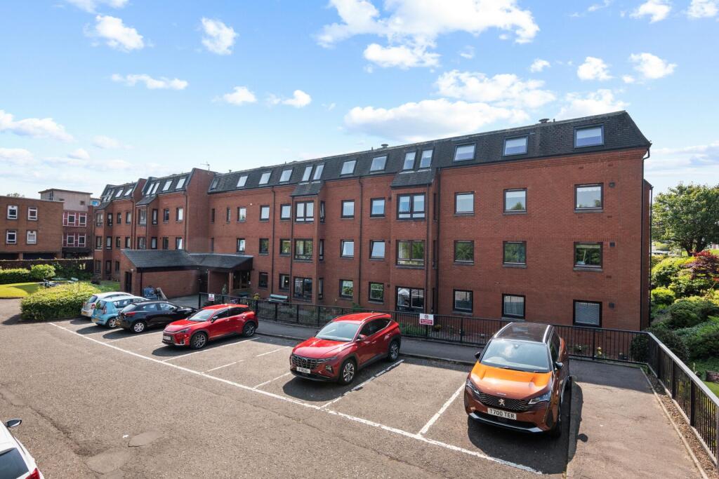 Main image of property: Flat 9, Elm Court, 97 Main Street, Milngavie, G62 6JQ