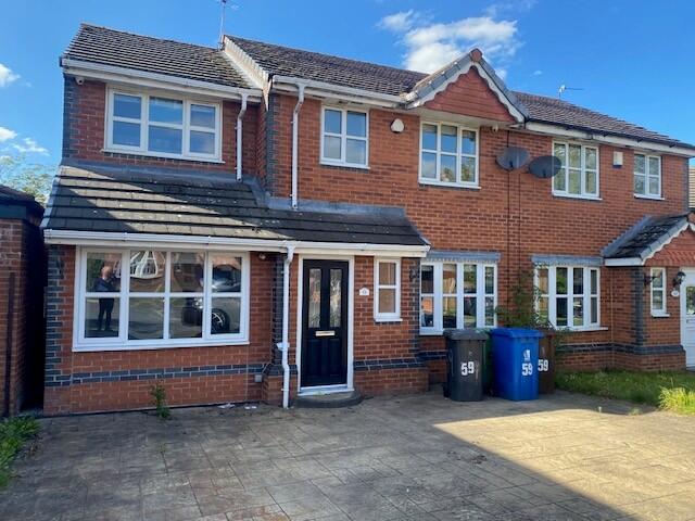 Main image of property: 59 Ansford Avenue, Abram, Wigan, Greater Manchester WN2 5PQ