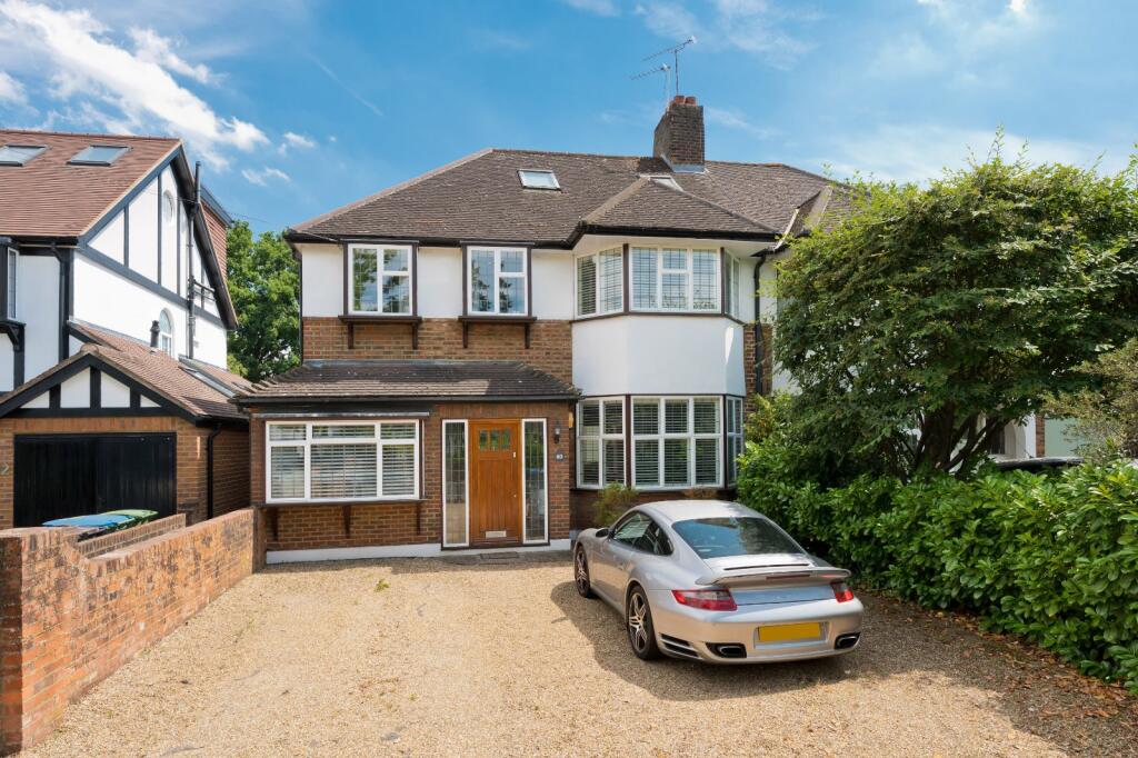 Main image of property: Manor Road North, Esher, Surrey, KT10