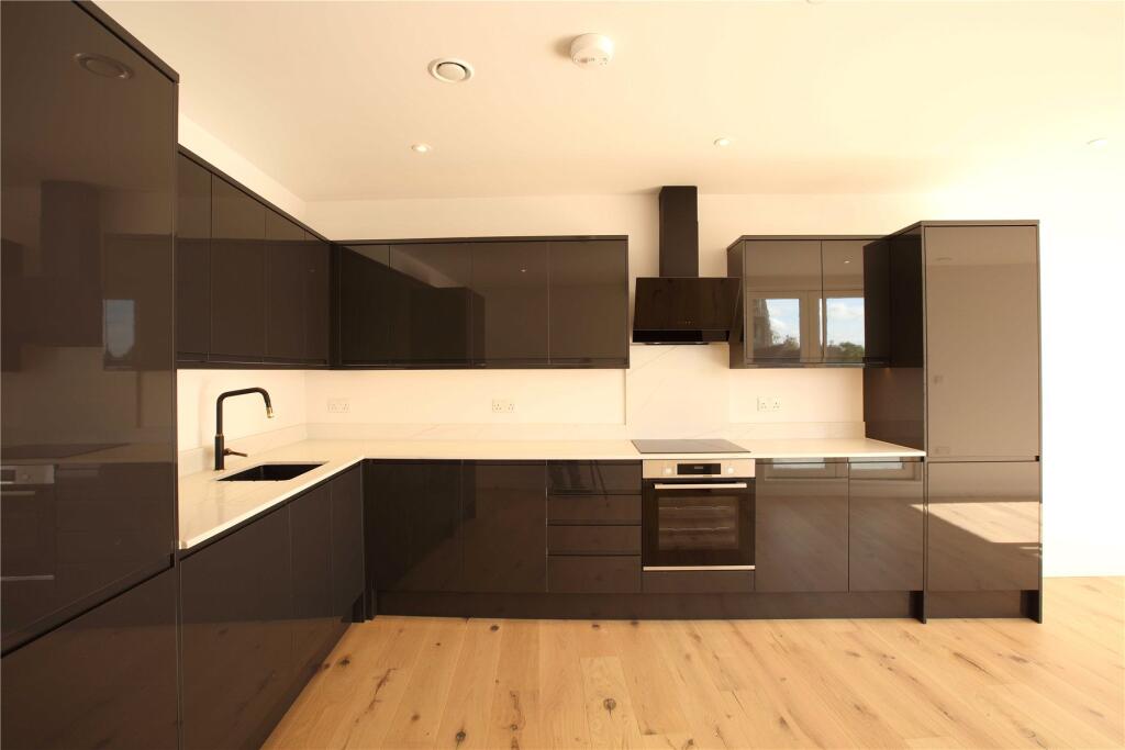 Main image of property: Churchfield Road, Weybridge, Surrey, KT13