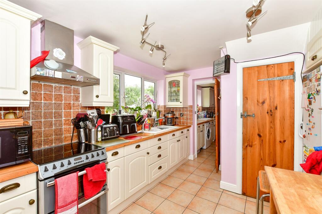 Main image of property: Woodfield Close, Redhill, Surrey
