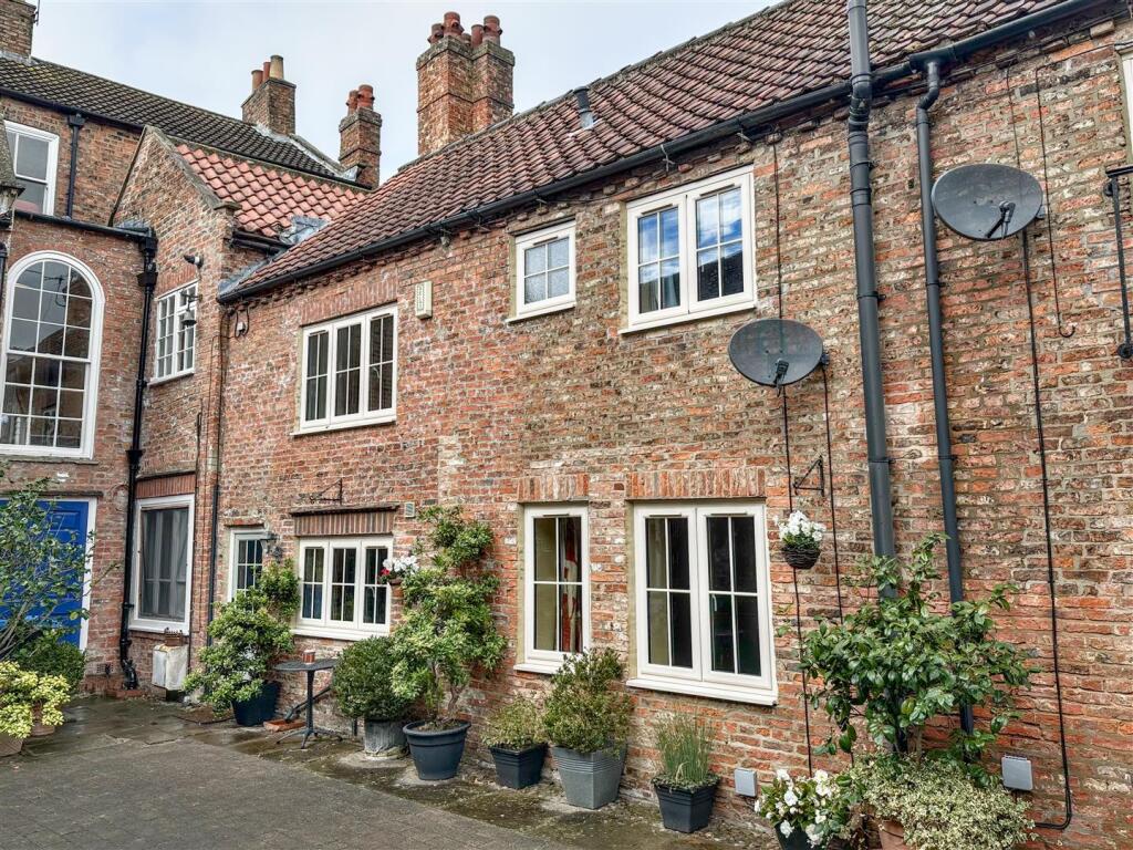 Main image of property: Bannister Court, Back Lane, Easingwold, YO61 3QW