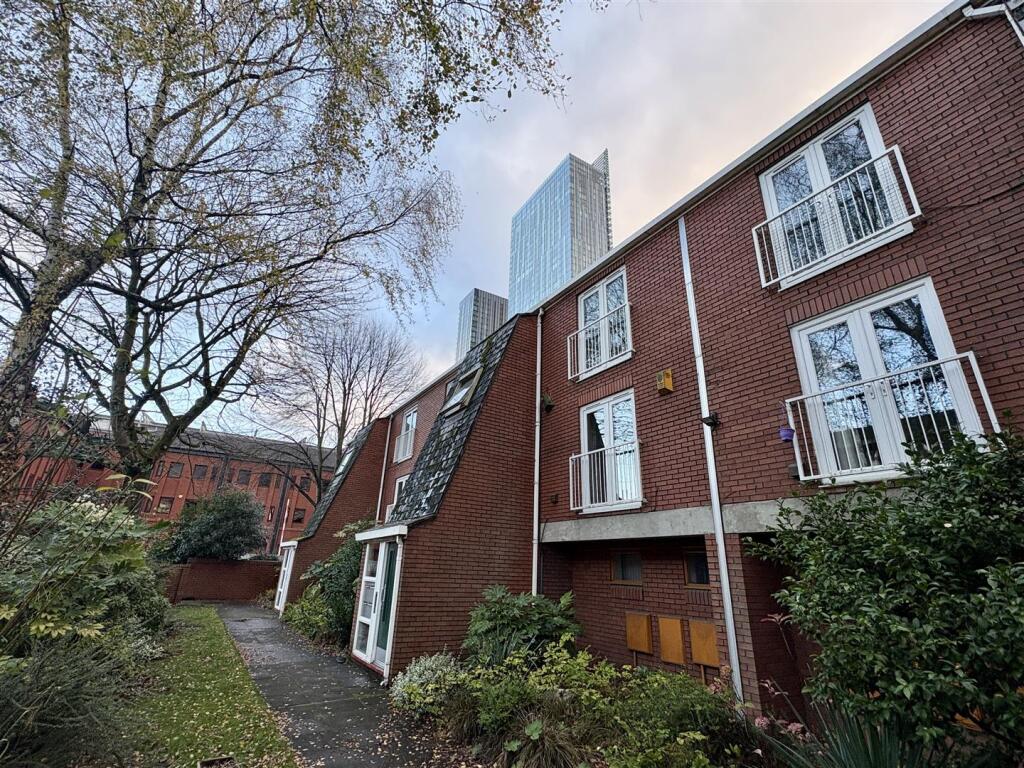Main image of property: Porchfield Square, Manchester