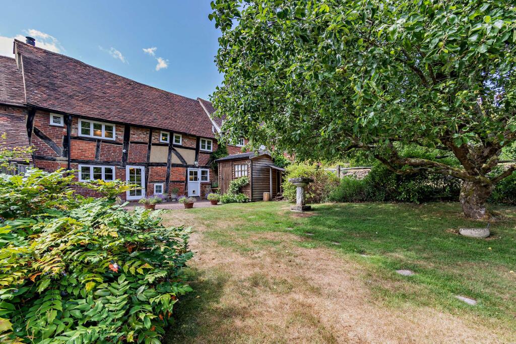 Main image of property: Maytree Cottage, Woodlands Road, Godalming