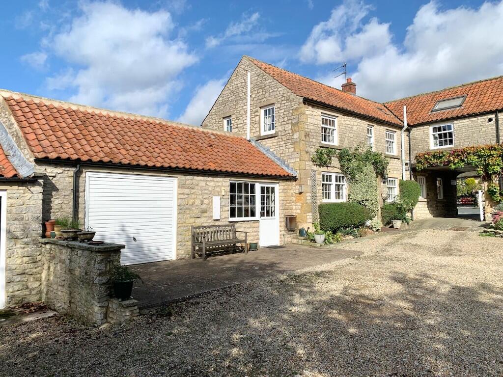 Main image of property: Old Barn Cottage, 1 Wrelton Court, Wrelton, YO18 8PX