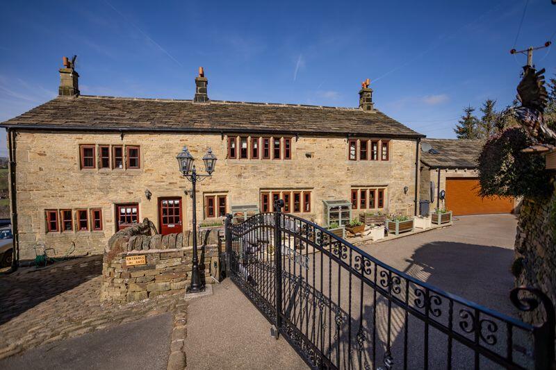 Main image of property: Bankhall Cottage, Barkisland, Halifax, HX4 0DJ