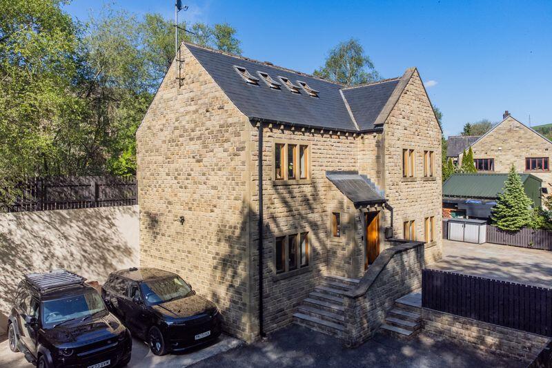 Main image of property: 63 Bar Lane, Ripponden, HX6 4EX