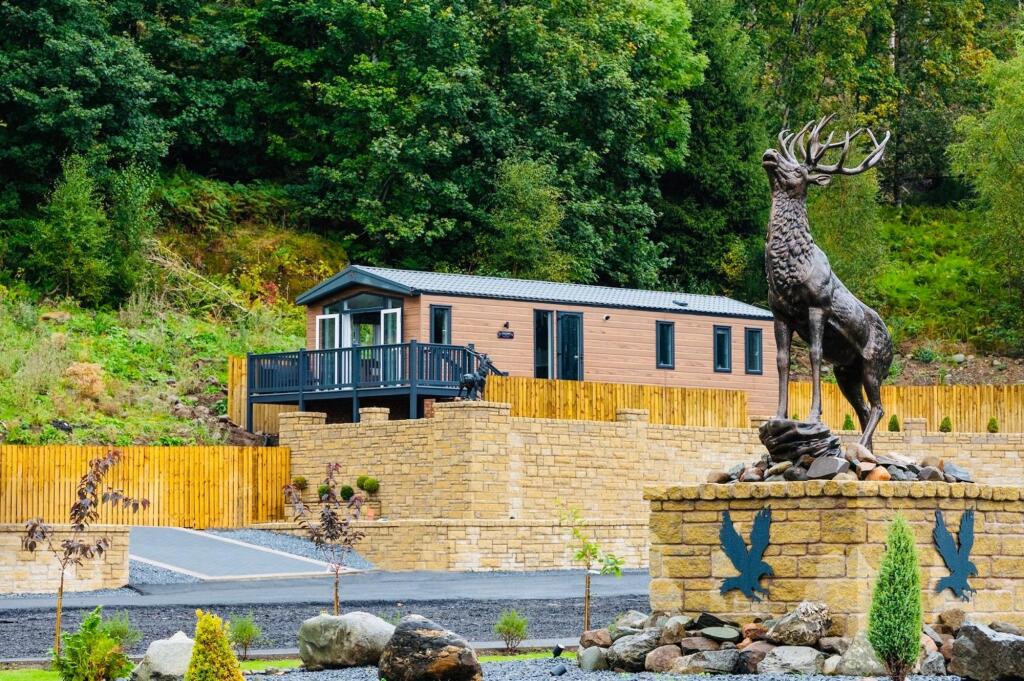 Main image of property: Loch Turret Lodge, 22 West Lodge Estate, Comrie. Crieff, PH6 2LS