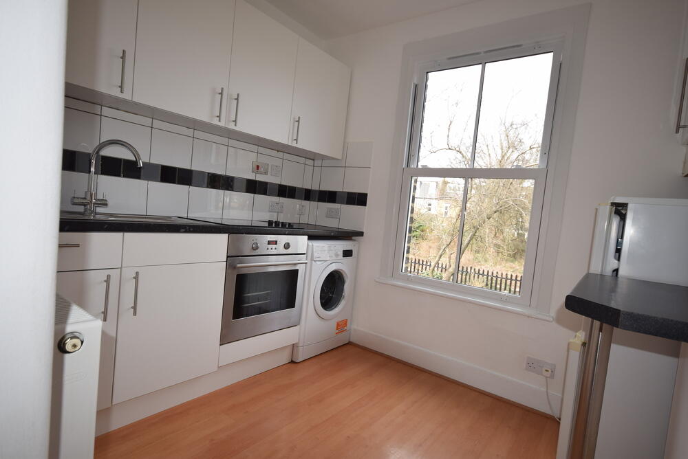 Main image of property: Craven Gardens, SW19: 1 bed 1 rec 1 bath unfurn
