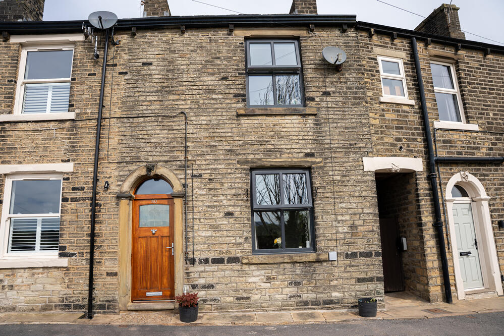 Main image of property: 80 Stoneswood Road, Delph, OL3 5DZ
