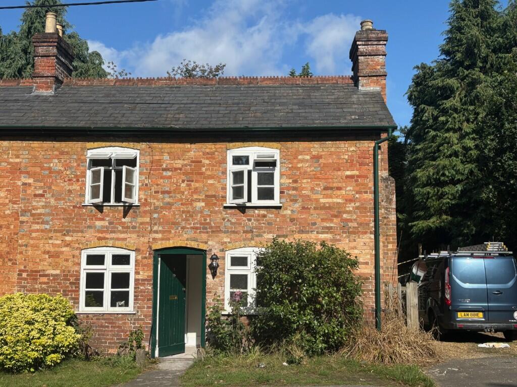 Main image of property: 2 Riverside Cottages, Hurn BH23 6AH