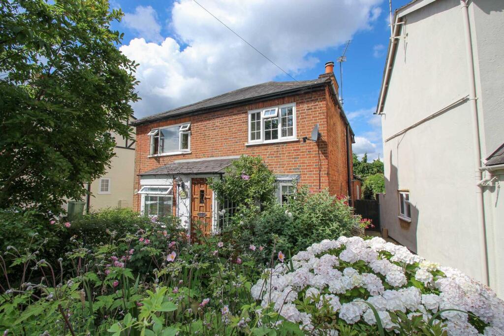 Main image of property: 20 Common Road, Claygate, KT10
