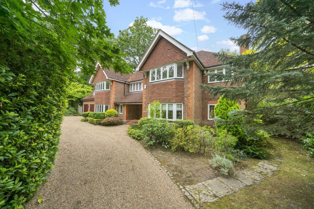 Main image of property: Woodside Road, Cobham, KT11