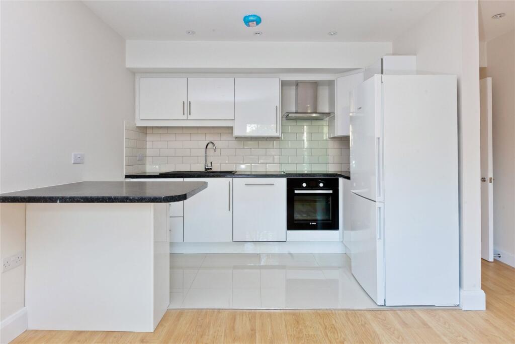 Main image of property: 68a High Street, Esher, Surrey, KT10