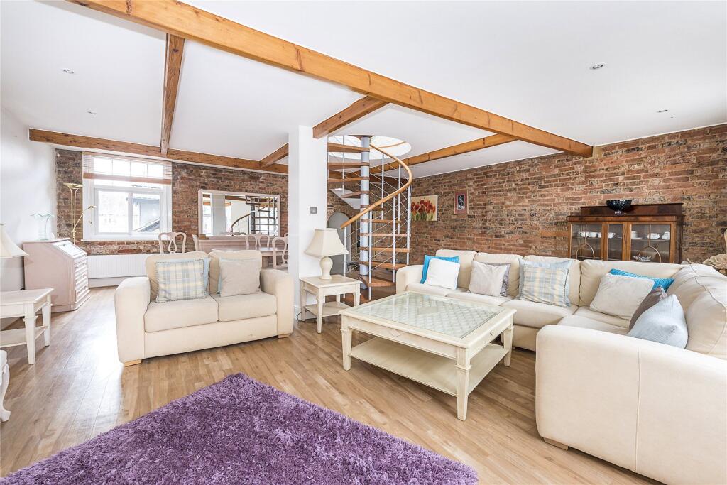 Main image of property: Between Streets, Cobham, Surrey, KT11