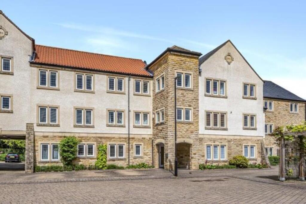 Main image of property: 73 Micklethwaite Grove, Wetherby LS22 5LA