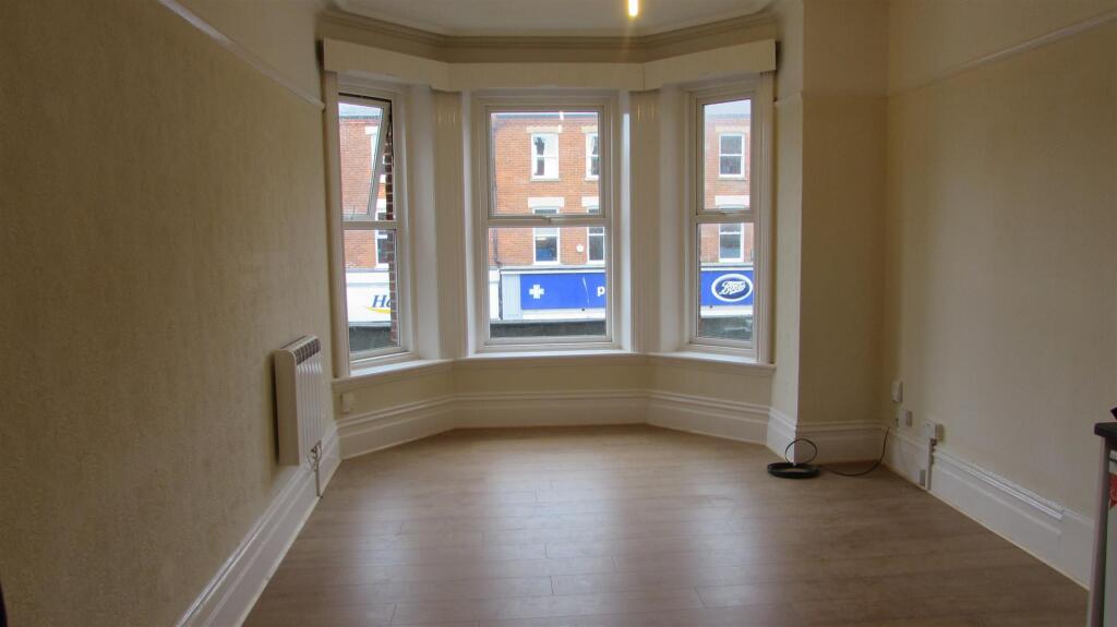Main image of property: TWO BEDROOM HIGH STREET APARTMENT