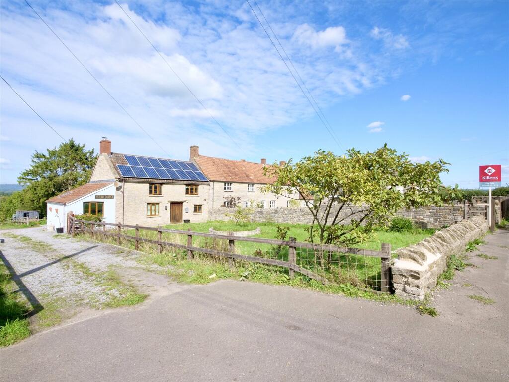 Main image of property: Charming country home with views of Glastonbury Tor