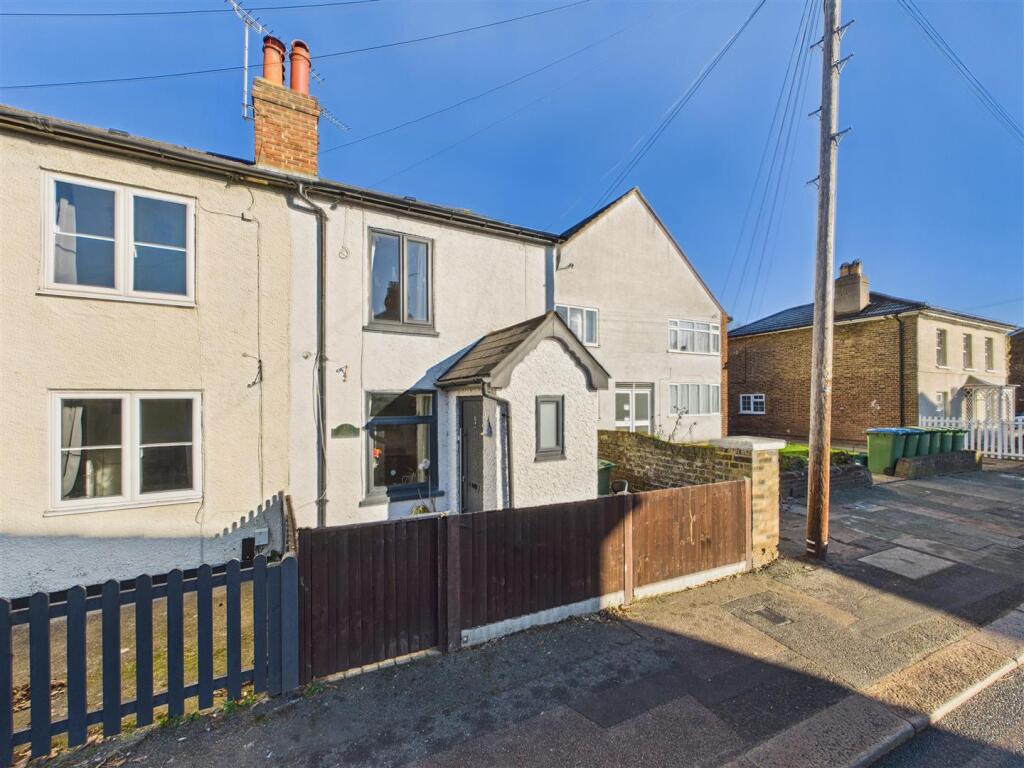 Main image of property: Queens Road, Hersham Village