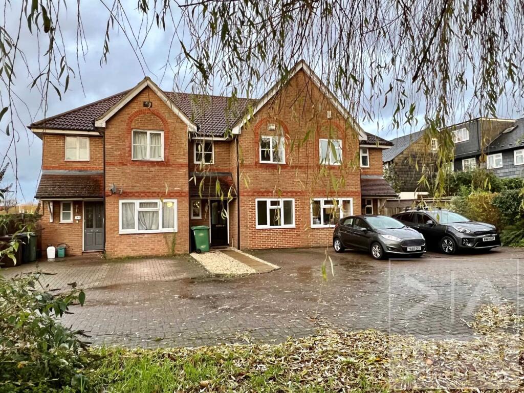 Main image of property: Farriers Road, Epsom, KT17 1NS