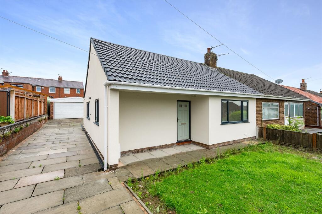 Main image of property: Coniston Avenue, Orrell, Wigan, Greater Manchester. WN5 8PR