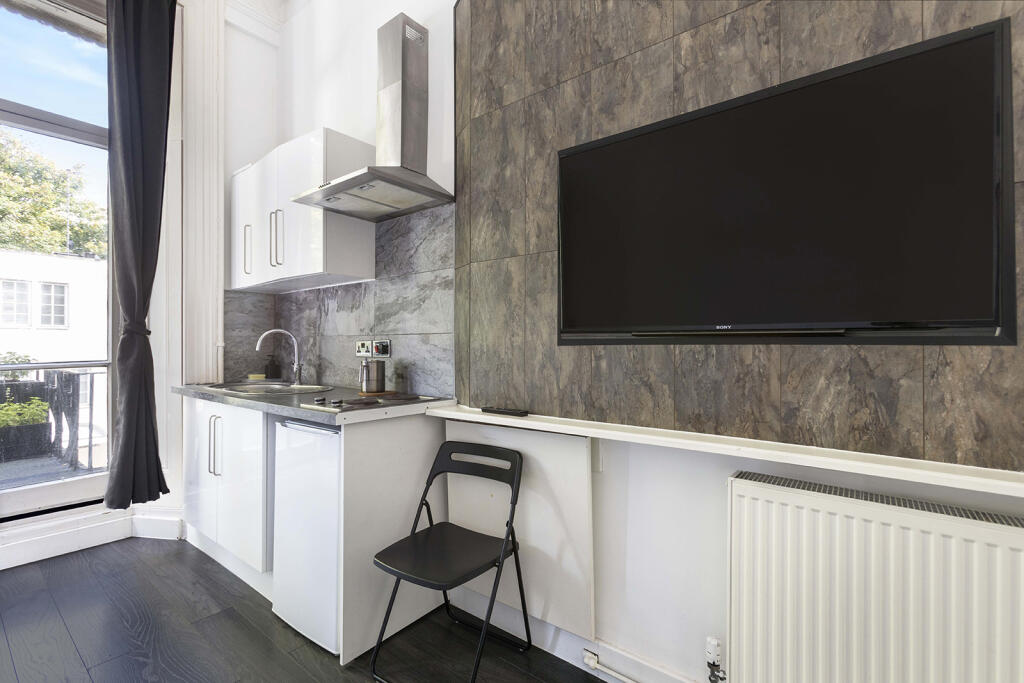 Main image of property: 12 Queensborough Terrace, W2