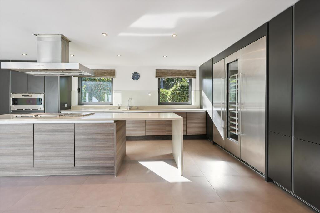 Main image of property: Woodpecker Close, Cobham, Surrey, KT11