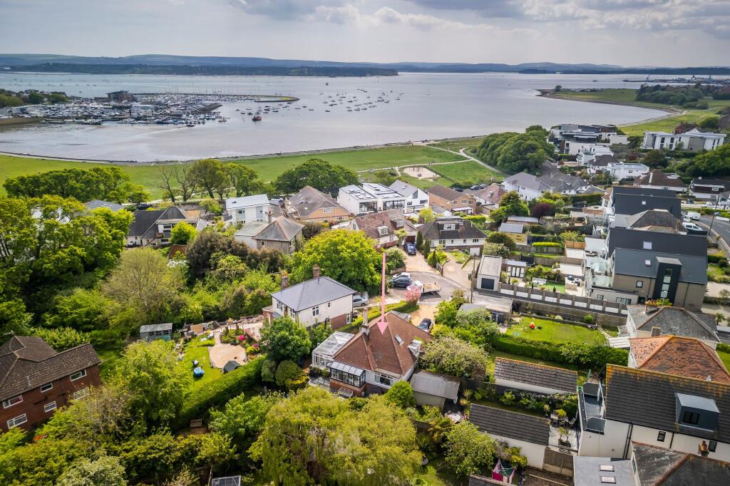 Main image of property: Castledene Crescent, Whitecliff, Poole BH14 8DP