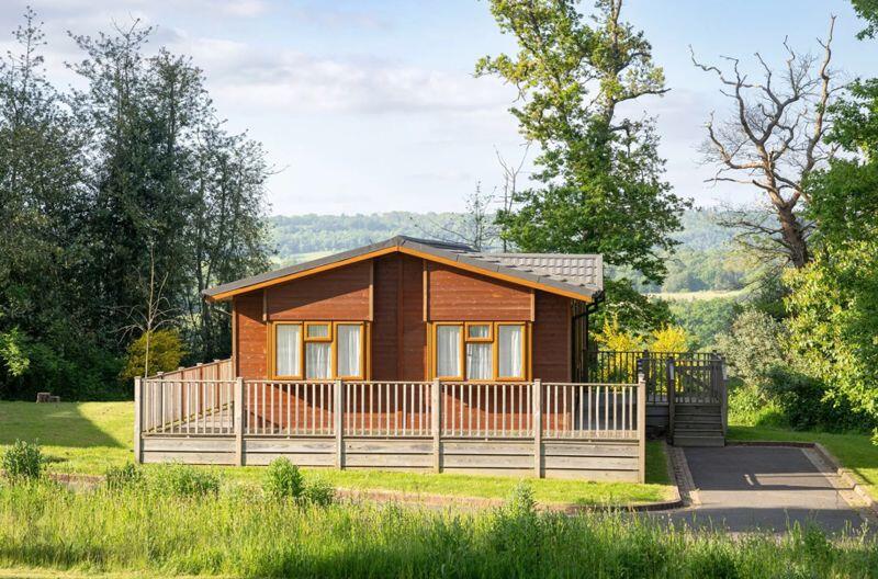 Main image of property: Luxury holiday lodges for sale in The Surrey Hills an area of outstanding natural beauty