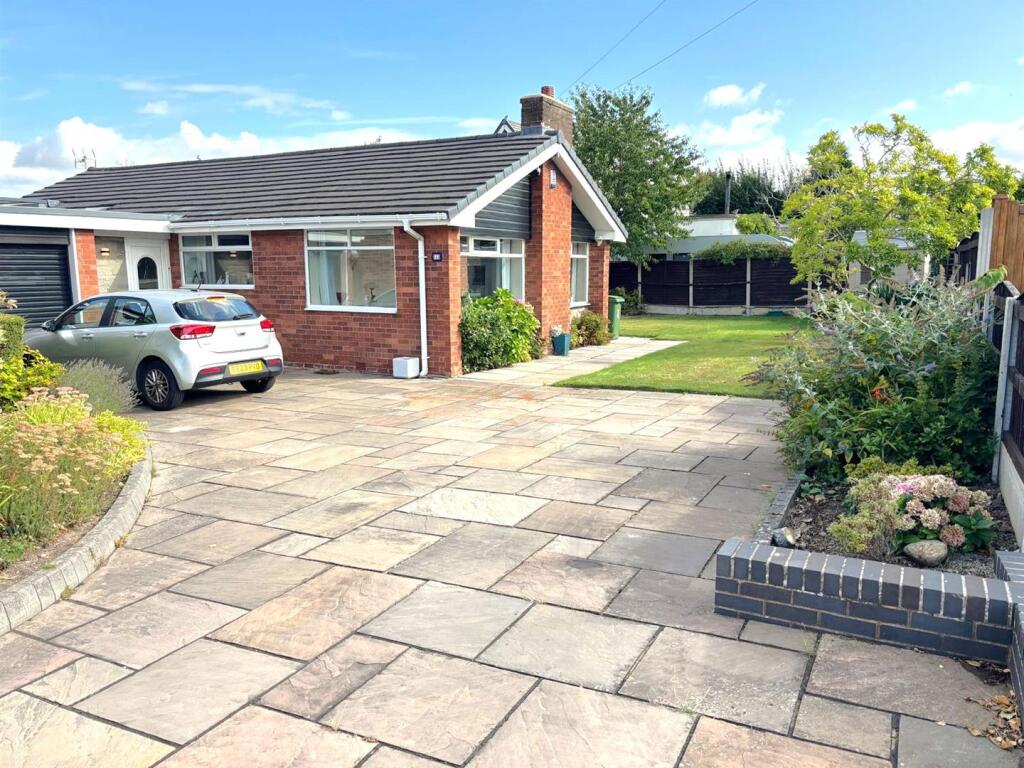 Main image of property: 4 Beech Grove, Lymm, WA13 0PL