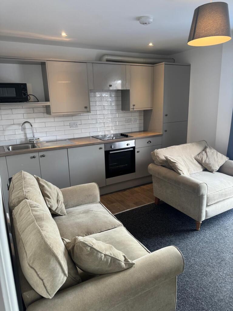 Main image of property: Ensuite // High Street // 1 Bed Apartment // JULY 2026