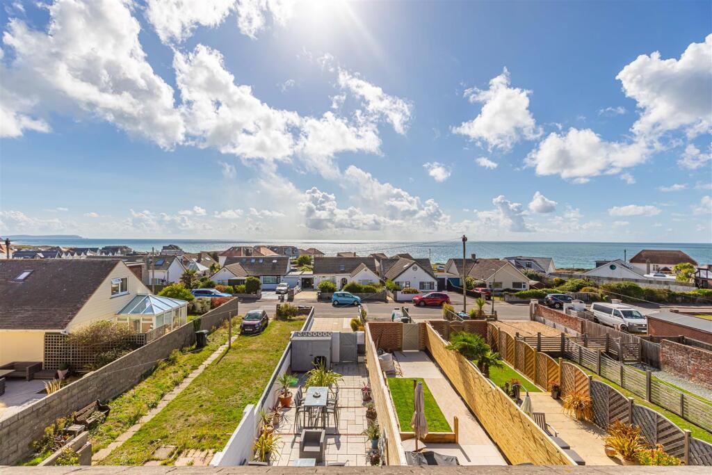 Main image of property: Beautifully Refurbished Coastal Townhouse with Exceptional Sea & Hengistbury Head Views