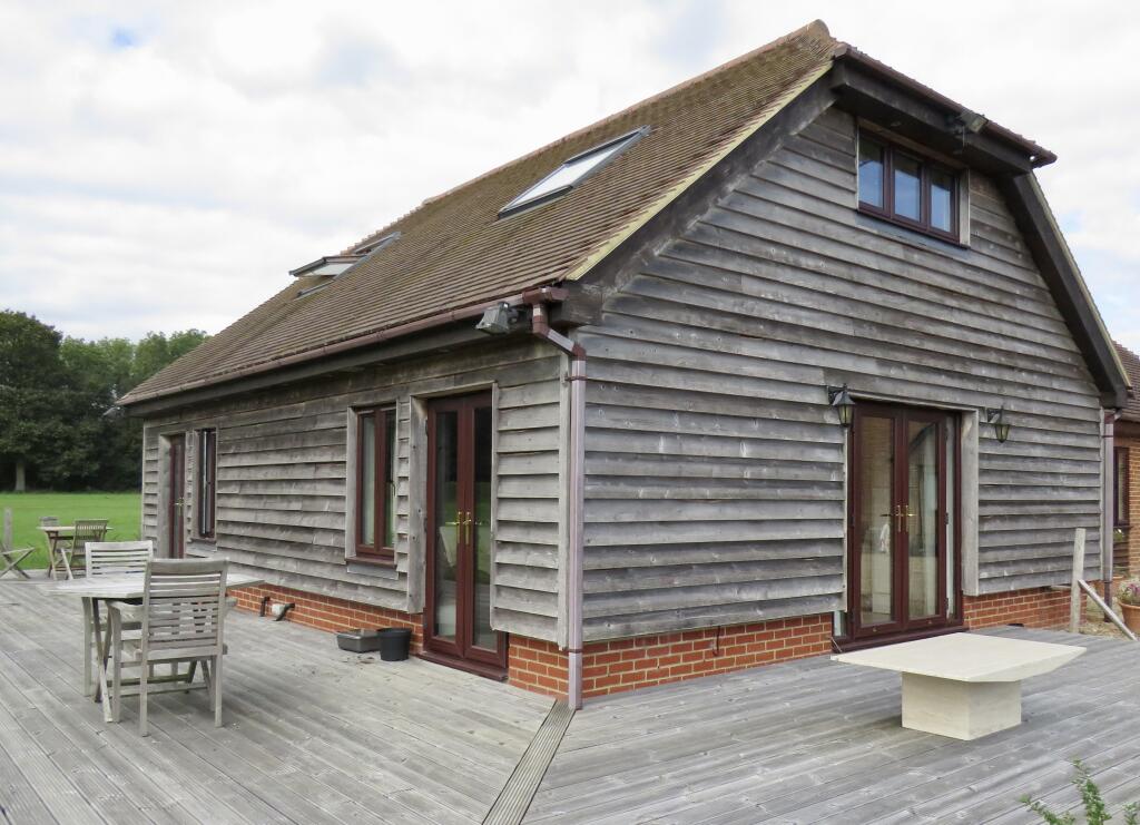 Main image of property: Coltstaple Lane, HORSHAM