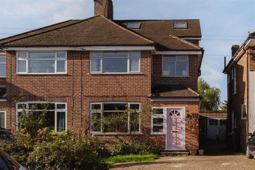Main image of property: Meadow Way, Reigate