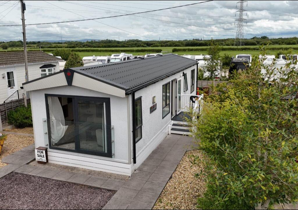 Main image of property: Greenfield Park, Freckleton, Preston, PR4 1UD