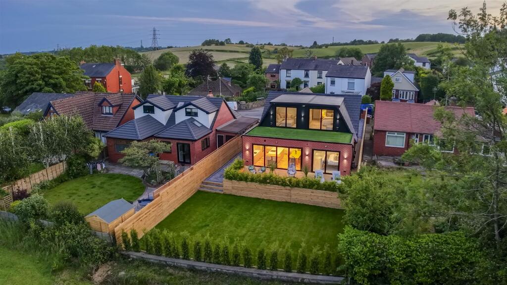 Main image of property: Healds Green, Chadderton, Oldham - Stunning, Newly Extended & Fully Refurbished 5 Bed Home With Superb Outlook