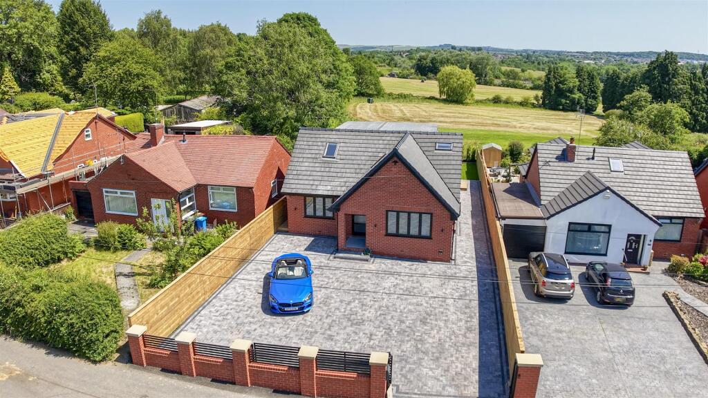 Main image of property: Healds Green, Chadderton, Oldham - Stunning, Newly Extended & Fully Refurbished 5 Bed Home With Superb Outlook