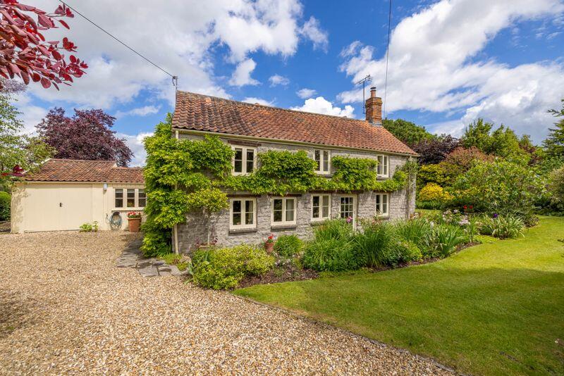 Main image of property: Parbrook - Charming Cottage with seamlessly blended modern addition and pretty mature gardens